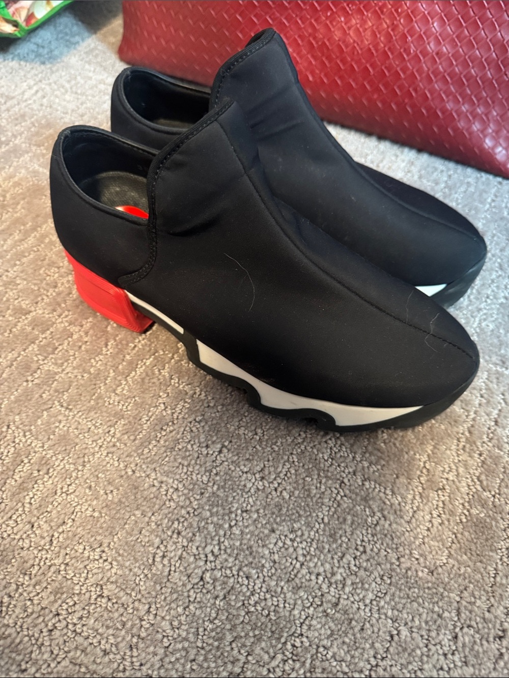 Black Slip-On Platform Sneakers with Red Heel Accent